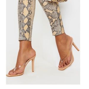 Nude clear strap heel